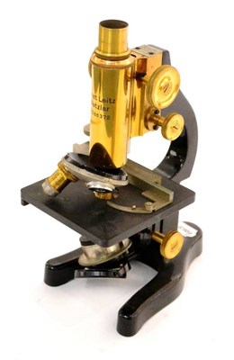 Lot 29 - Ernst Leitz Wetzlar Microscope No. 286372 with brass barrel, black lacquered stage and stand,...