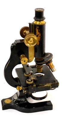 Lot 34 - Spence Lens Company (USA) Microscope with black lacquered stand and tube, three lens turret,...