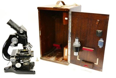 Lot 37 - Watson Bactil Binocular Microscope No 120372 black lacquered with four lens turret, condenser,...