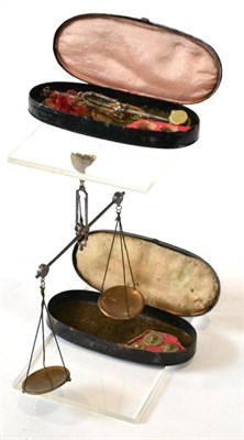 Lot 91 - Two Guinea Scales (i) 1.5"; 3.6cm copper pans, steel beam with three brass weights (ii) 1.5";,...