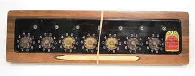 Lot 35 - Smallwood Calculating Machine with seven 10-digit discs and sloped mahogany back