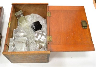 Lot 39 - Various Glass Solids a collection of assorted regular and irregular solids including two cubes...