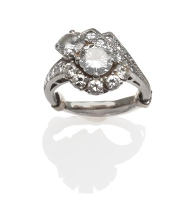 Lot 154 - A Diamond Cocktail Ring, two round brilliant cut diamonds within asymmetric borders of round...