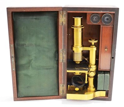 Lot 78 - A French brass compound microscope by E Hartnack, Paris No. 7545, fitted in the original...