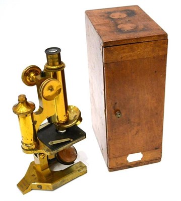 Lot 86 - R & J Beck Microscope lacquered brass with black stage, rotating triple objective lens mounting...