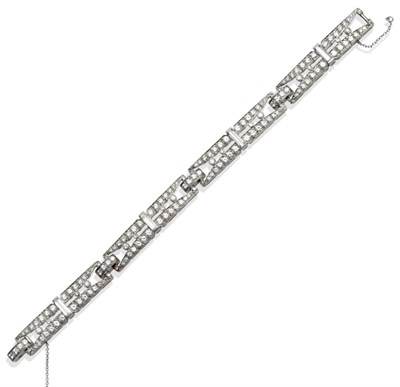 Lot 157 - ~ A Diamond Bracelet, of tapering links, set with round brilliant cut diamonds, collet set...