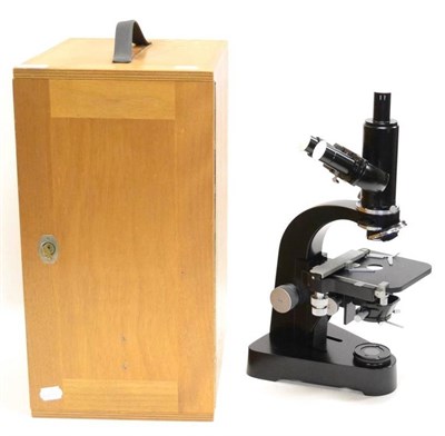 Lot 114 - Leitz Laborlux Binocular Microscope No. 711588 with instructions and accessories in wooden case