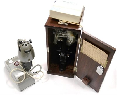 Lot 118 - Watson Kima Microscope in black lacquered metal with twin turret and condenser, in stained wood box