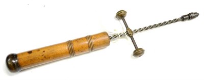 Lot 178 - A Tony Dussleux No.3 Push Drill, the beech handle with removable end containing drill bits
