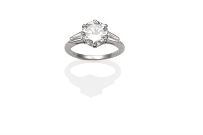 Lot 169 - A Platinum Diamond Ring, by Cartier, a round brilliant cut diamond in a six claw setting, with...