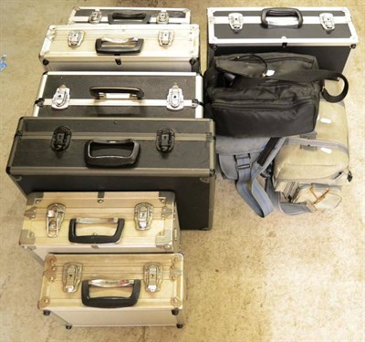 Lot 202 - Camera Accessories a quantity of empty hard case, flashes, straps, tripods and others (qty)