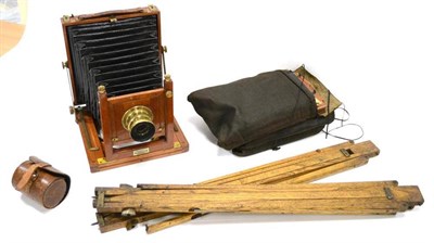 Lot 209 - Gould Half Plate Field Camera 'The Society'  in mahogany and brass with makers plate to front...