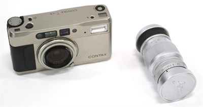 Lot 217 - Leica Elmar f4, 90mm Lens silver no. 1700702 and a Contax TVS Compact camera (2)