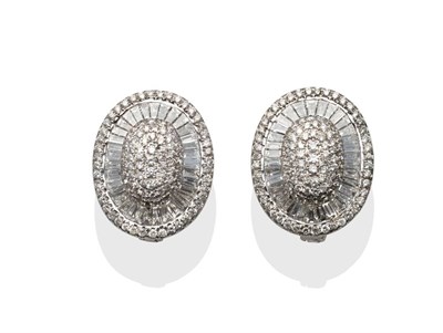 Lot 174 - A Pair of Diamond Cluster Earrings, the oval earrings with a pavé set central oval of...