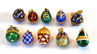 Lot 178 - ~ Nine Egg Charms and An Acorn Charm, enamelled in assorted colours, some set with white paste...
