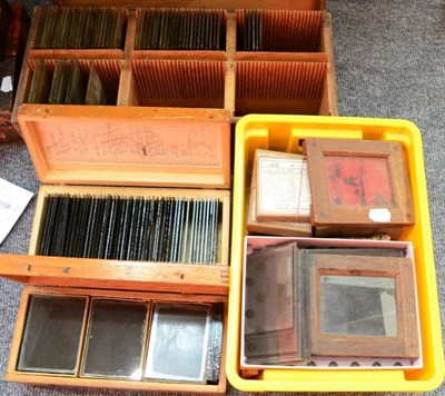 Lot 284 - Photographic Glassplate Negatives a quantity of assorted images contained in two wooden slotted...