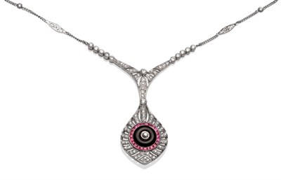 Lot 182 - ~ An Art Deco Style Onyx, Ruby and Diamond Necklace, a collet set diamond centres an onyx, within a