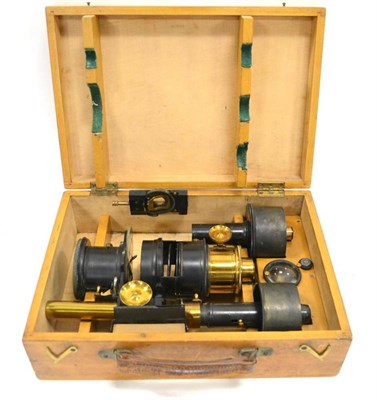 Lot 289 - Newtons Patent Magic Lantern Projection Microscope brass and black lacquered in three main...