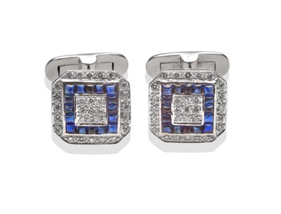 Lot 183 - ~ A Pair of Sapphire and Diamond Cluster Cufflinks, the octagonal heads set with round...