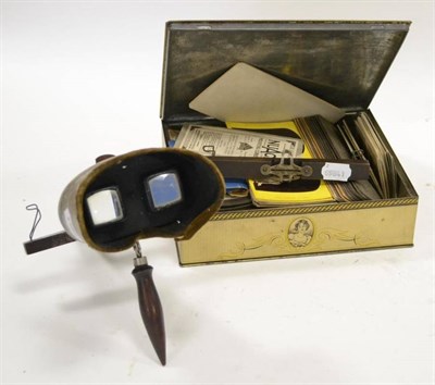 Lot 301 - Underwood & Underwood Hand Held Stereo Viewer together with approximately 80 stereo cards including