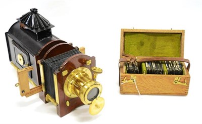 Lot 306 - Magic Lantern with brass lens mount, bellows/thumb wheel focussing, fitted with electric lamp...