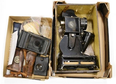 Lot 308 - Baby Hand Cranked Cine Projector (Made In France) in remains of original box together with a Pathex