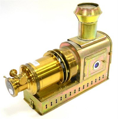 Lot 310 - Riley Bros Magic Lantern with unusual gold finish to casing with brass lens and fitted with...