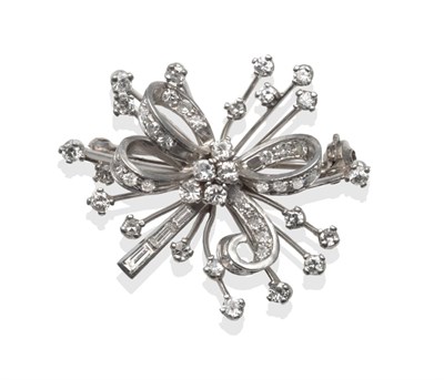 Lot 194 - A Diamond Brooch, the looped design inset with round brilliant cut, eight-cut and baguette cut...