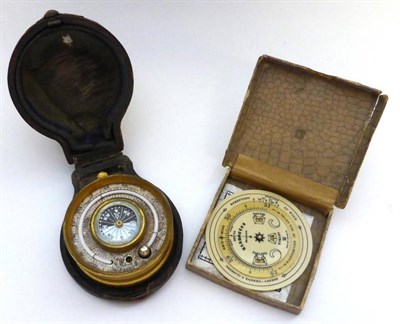 Lot 1005 - Brass Cased Aneroid Barometer with compass verso and no makers mark, in leather case and a Negretti