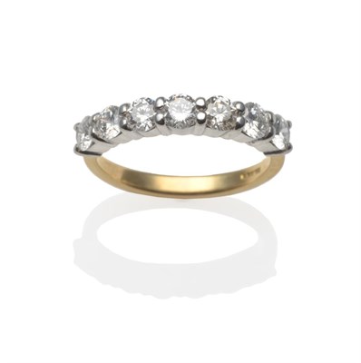 Lot 215 - An 18 Carat Gold Diamond Half Hoop Ring, round brilliant cut diamonds in white claw settings on...