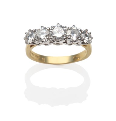 Lot 216 - An 18 Carat Gold Diamond Five Stone Ring, the slightly graduated diamonds in white claw...