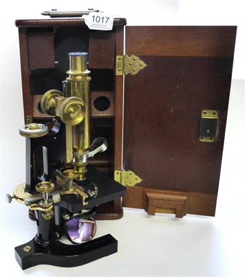 Lot 1017 - Bausch & Lomb Brass Microscope with rack and pinion focussing, twin swivel mount for two...