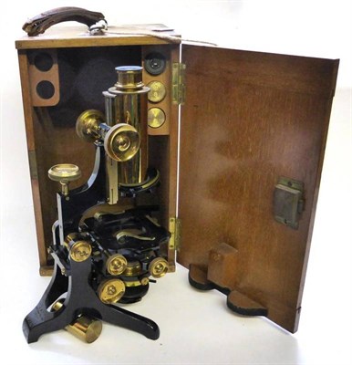 Lot 1018 - G Baker (London) Brass Microscope with triple rotating mount for objective lenses, adjustable...