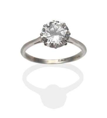 Lot 217 - A Diamond Solitaire Ring, the round brilliant cut diamond in a white eight claw setting, to a...