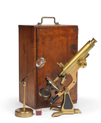Lot 1026 - W Heath (Plymouth) Brass Microscope with rack and pinion focusing, two objective lenses on...