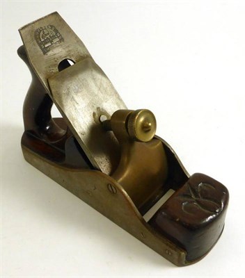Lot 1040 - A 9 Inch Steel Smoothing Plane, with ridged sole, rosewood infill and handle, brass lever cap,...