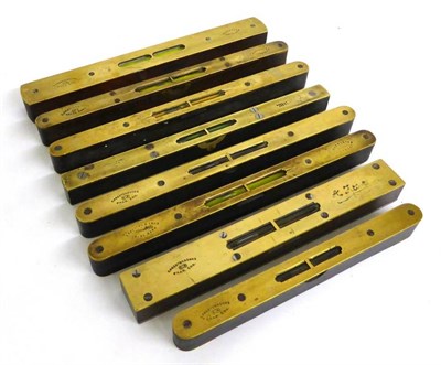 Lot 1045 - Eight Brass Faced Spirit Levels By E Preston & Sons, various sized, ebony and rosewood bodies