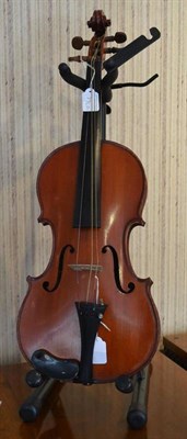 Lot 1076 - A 20th Century English Violin, no label, with a 359mm two piece back, mixed tuning pegs, with a bow