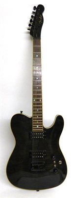 Lot 1083 - A Fender Korean Custom Telecaster, serial number 03051432, with shaped mahogany body, maple...