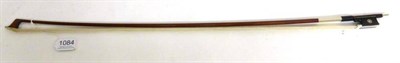 Lot 1084 - A German Silver Mounted Violin Bow, stamped 'Albert Nurnberger', the ebony frog with enclosed pearl