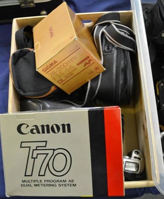 Lot 1146 - Canon Cameras: EOS 500, T70 with original box and makers soft case, T90 in makers soft case, FD...