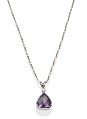 Lot 233 - An 18 Carat White Gold Amethyst and Diamond Pendant on Chain, a pear shaped faceted amethyst...