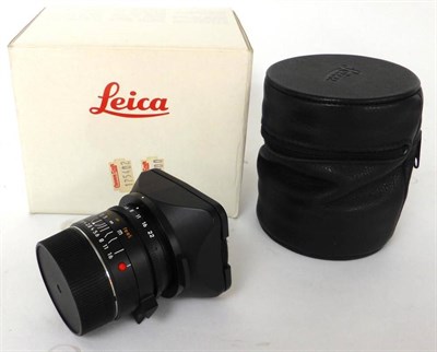 Lot 1165 - Leica Elmarit F2-8/28mm lens No.3608451, for a Leica 'M' camera, with black anodized finish,...
