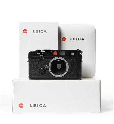 Lot 1171 - Leica M6 Camera Body black, no.2296021, in plastic case with card outer and passport