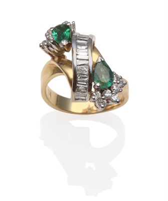 Lot 246 - ~ An Emerald and Diamond Cluster Twist Ring, a vertical row of tapered baguette cut diamonds in...