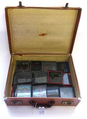 Lot 1238 - Magic Lantern Slides a collection of over 115 3.5"; (19cm) square glass slides, mostly with...