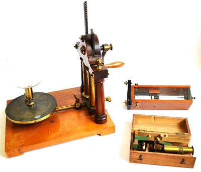 Lot 1008 - A 19th Century Adams Type Vacuum Pump, constructed of mahogany and lacquered brass, with brass...