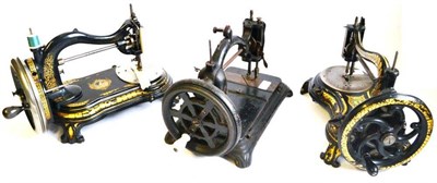 Lot 1014 - Three Victorian Free Standing Cast Iron Sewing Machines, including Jones Hand Machine, Bradbury...