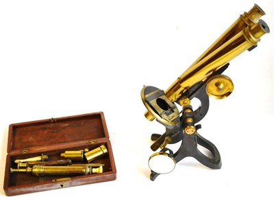 Lot 1017 - A Lacquered Brass and Black Enamelled Binocular Compound Microscope by Swift & Son, Tottenham Court