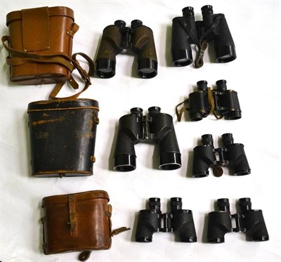 Lot 1028 - Eight Pairs of Binoculars, comprising Optical & Film Supply Co. military issue 7 x 50, cased,...